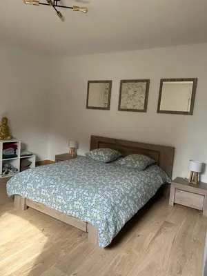 Un ou plusieurs lits dans un hébergement de l'établissement Maison calme à la campagne