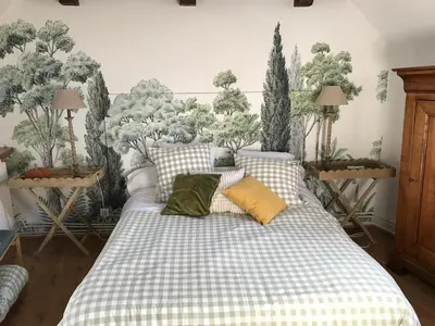 Un ou plusieurs lits dans un hébergement de l'établissement Maison des Roses