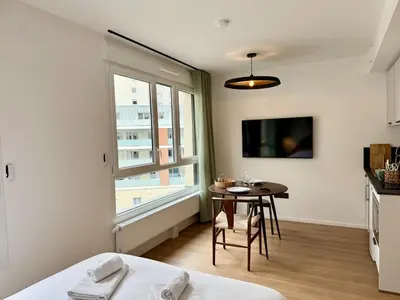 Un ou plusieurs lits dans un hébergement de l'établissement We Live Inn Sharies Reims B303