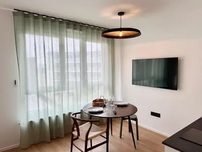 Télévision ou salle de divertissement dans l'établissement We Live Inn Sharies Reims B303