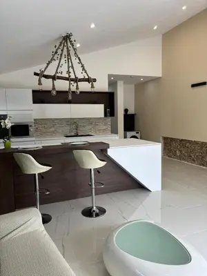 Cuisine ou kitchenette dans l'établissement La Champoternoise