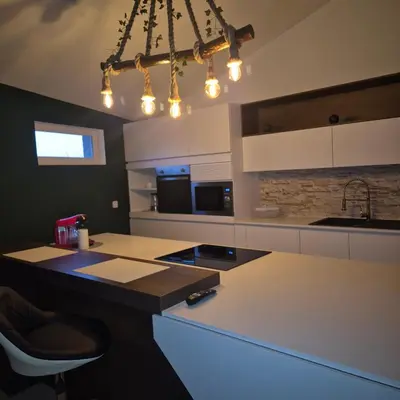 Cuisine ou kitchenette dans l'établissement La Champoternoise