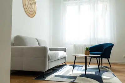 Coin salon dans l'établissement Le Châlons Cosy T2 calme
