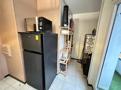 Cuisine ou kitchenette dans l'établissement Fléchambault face à la Basilique avec terrasse
