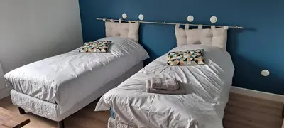 Un ou plusieurs lits dans un hébergement de l'établissement la Maison d'à côté Chambre 3