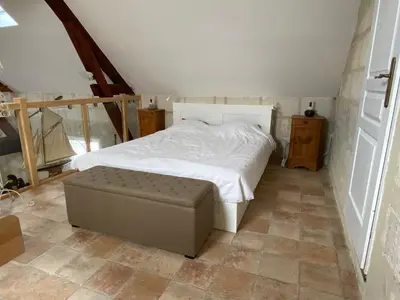Un ou plusieurs lits dans un hébergement de l'établissement maison au calme avec piscine chauffée