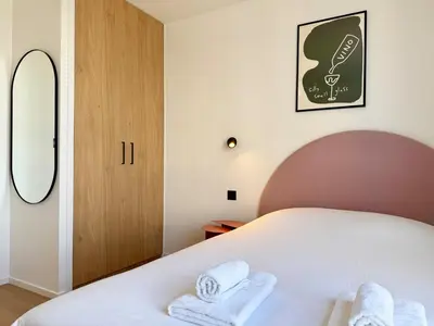 Un ou plusieurs lits dans un hébergement de l'établissement We Live Inn Sharies Reims A301