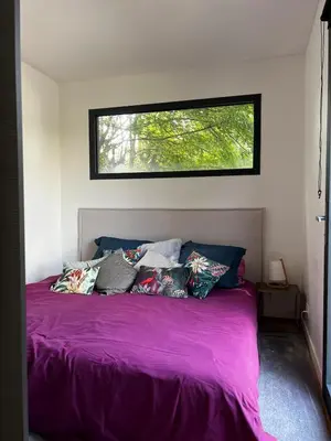 Un ou plusieurs lits dans un hébergement de l'établissement Nature break near Disney