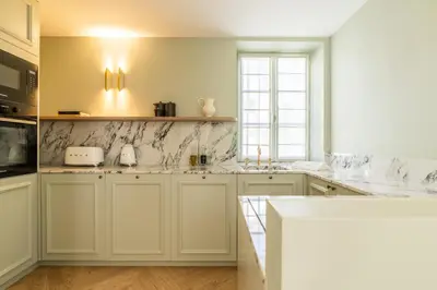 Cuisine ou kitchenette dans l'établissement Le Domaine by A&G - Vendrest