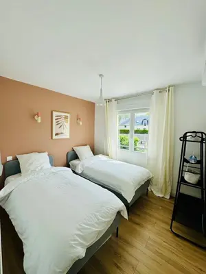 Un ou plusieurs lits dans un hébergement de l'établissement La maison de Lili