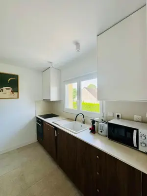 Cuisine ou kitchenette dans l'établissement La maison de Lili
