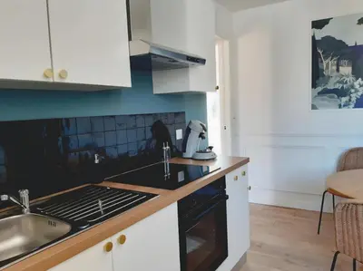 Cuisine ou kitchenette dans l'établissement L'élégance aux portes des caves