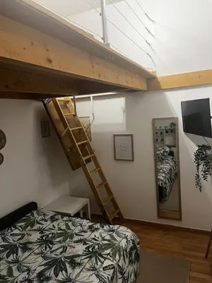 Un ou plusieurs lits dans un hébergement de l'établissement Le Cosy Champenois! Reims Arena