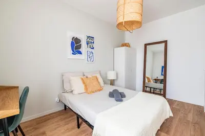Un ou plusieurs lits dans un hébergement de l'établissement Maison du Barbâtre - 4 chambres chaleureuses