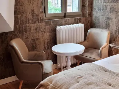 Un ou plusieurs lits dans un hébergement de l'établissement La Villa des Tendances