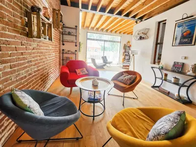 Coin salon dans l'établissement Loft Campagnard, Jardin, Terrasse