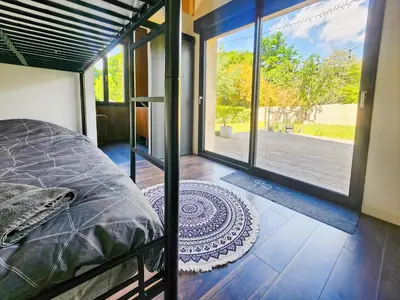 Un ou plusieurs lits dans un hébergement de l'établissement Loft Campagnard, Jardin, Terrasse