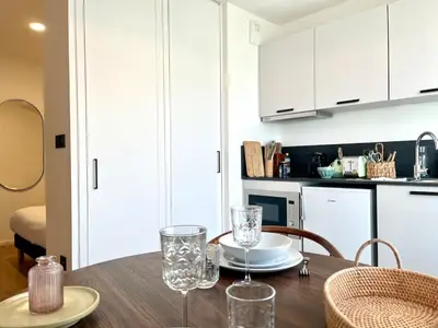 Cuisine ou kitchenette dans l'établissement We Live Inn Sharies Reims - B502
