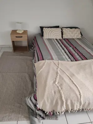 Un ou plusieurs lits dans un hébergement de l'établissement APPARTEMENT FRIZEBOIs
