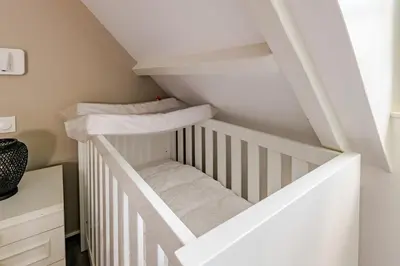 Un ou plusieurs lits dans un hébergement de l'établissement Magnifique villa au cœur de la nature