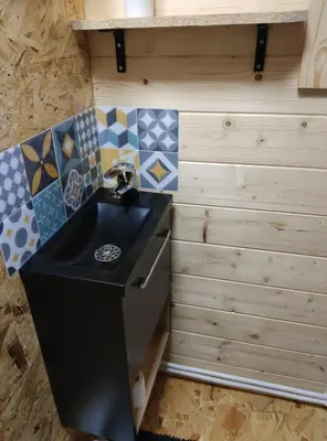 Cuisine ou kitchenette dans l'établissement Le chalet des Sarteaux