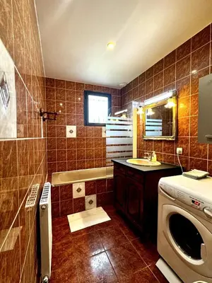 Salle de bains dans l'établissement Maison familiale Vintage à Meaux