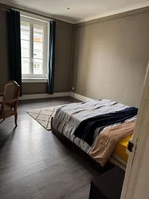 Un ou plusieurs lits dans un hébergement de l'établissement Appartement 3 chambres 6 personnes