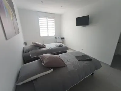 Un ou plusieurs lits dans un hébergement de l'établissement Gîte le Cubry