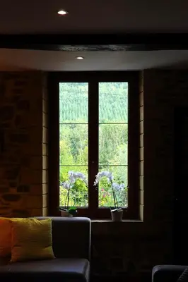 Coin salon dans l'établissement Large house in the French Ardennes