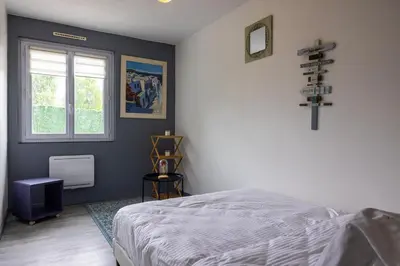 Un ou plusieurs lits dans un hébergement de l'établissement Maison près de Disneyland