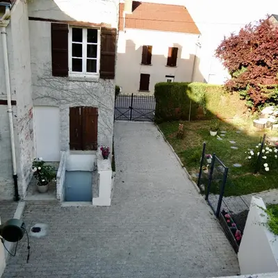 Jardin de l'établissement L'Écrin des Arts - appartement avec jardin au coeur de la Côte des Blancs
