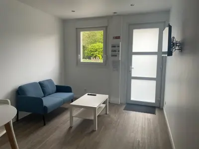 Coin salon dans l'établissement Appartement climatisé neuf