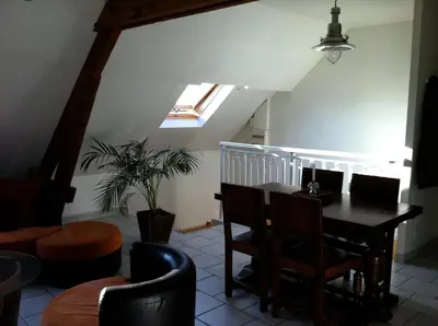 Coin salon dans l'établissement Grand Appartement Chill