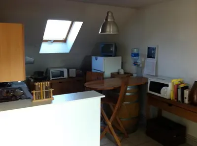 Cuisine ou kitchenette dans l'établissement Grand Appartement Chill