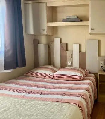 Un ou plusieurs lits dans un hébergement de l'établissement Lodge de Valébrune