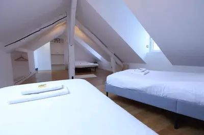 Un ou plusieurs lits dans un hébergement de l'établissement Lenoir magnifique maison 8 pers avec terrasse