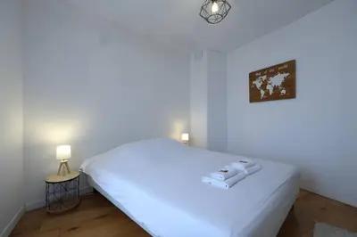 Un ou plusieurs lits dans un hébergement de l'établissement Lenoir magnifique maison 8 pers avec terrasse