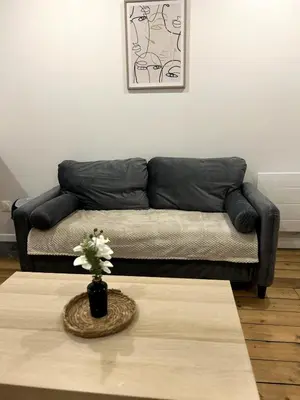 Coin salon dans l'établissement T2 neuf proche gare et centre ville de Reims