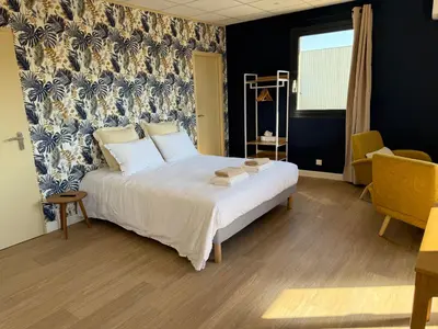 Un ou plusieurs lits dans un hébergement de l'établissement Suite du Spa 2 - Parking Privé Gratuit