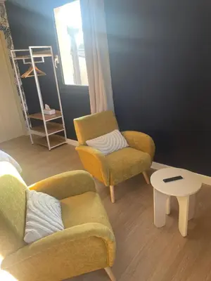Coin salon dans l'établissement Suite du Spa 2 - Parking Privé Gratuit