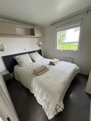 Un ou plusieurs lits dans un hébergement de l'établissement bungalow de l'escaut