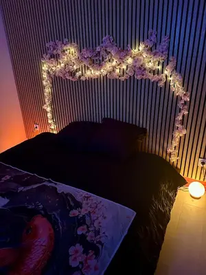 Un ou plusieurs lits dans un hébergement de l'établissement Sakura Suite - Jacuzzi and Cinema