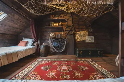 Un ou plusieurs lits dans un hébergement de l'établissement Maison Immersive Cinéma & Harry Potter 6 pers