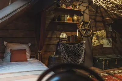 Un ou plusieurs lits dans un hébergement de l'établissement Maison Immersive Cinéma & Harry Potter 6 pers