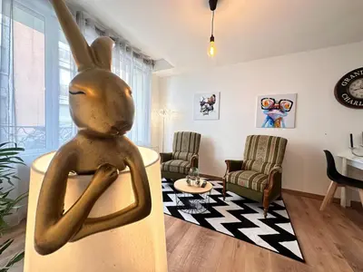 Coin salon dans l'établissement Le repère dAlice T2 cosy proche centre