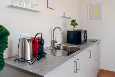 Cuisine ou kitchenette dans l'établissement La simplicité, climatisé avec entrée autonome