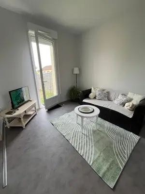 Télévision ou salle de divertissement dans l'établissement Petit coin de verdure au cœur de vitry