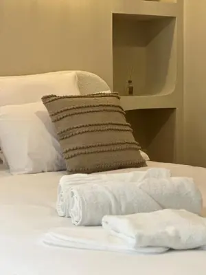 Un ou plusieurs lits dans un hébergement de l'établissement Suite Élan by CollectionAura - Hypercentre Charleville-Mézières