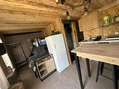 Cuisine ou kitchenette dans l'établissement Chalet champêtre Le Doux Refuge