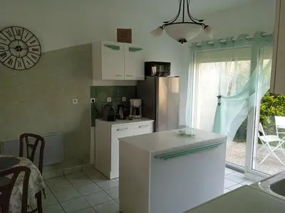 Cuisine ou kitchenette dans l'établissement Maison au 55